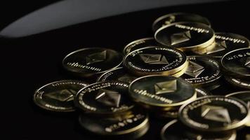 Rotating shot of Bitcoins digital cryptocurrency - BITCOIN ETHEREUM 155 video