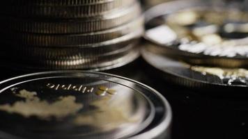 Rotating shot of Bitcoins digital cryptocurrency - BITCOIN RIPPLE 0216 video