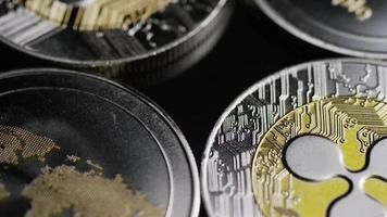 Rotating shot of Bitcoins digital cryptocurrency - BITCOIN RIPPLE 0169 video