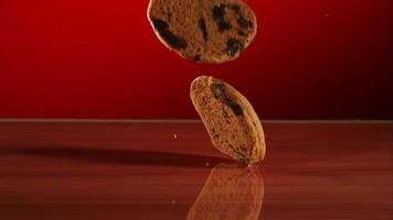 Cookies falling and bouncing in ultra slow motion (1,500 fps) on a reflective surface - COOKIES PHANTOM 022 video