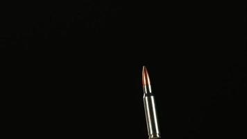 Bullets falling and bouncing in ultra slow motion 1,500 fps on a reflective surface - BULLETS PHANTOM 038 video