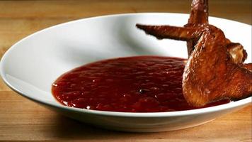 BBQ Chicken splashing in ultra slow motion 1,500 fps into BBQ sauce - BBQ PHANTOM 070 video