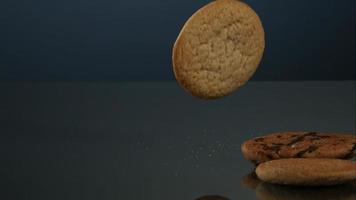 Cookies falling and bouncing in ultra slow motion 1,500 fps on a reflective surface - COOKIES PHANTOM 125 video