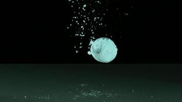 Doughnuts falling and bouncing in ultra slow motion 1,500 fps on a reflective surface - DOUGHNUTS PHANTOM 001 video