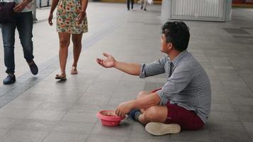 Young man tourist begging after spending too much money video