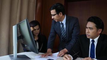 Angry boss dissatisfied with bad com result from employee in office video
