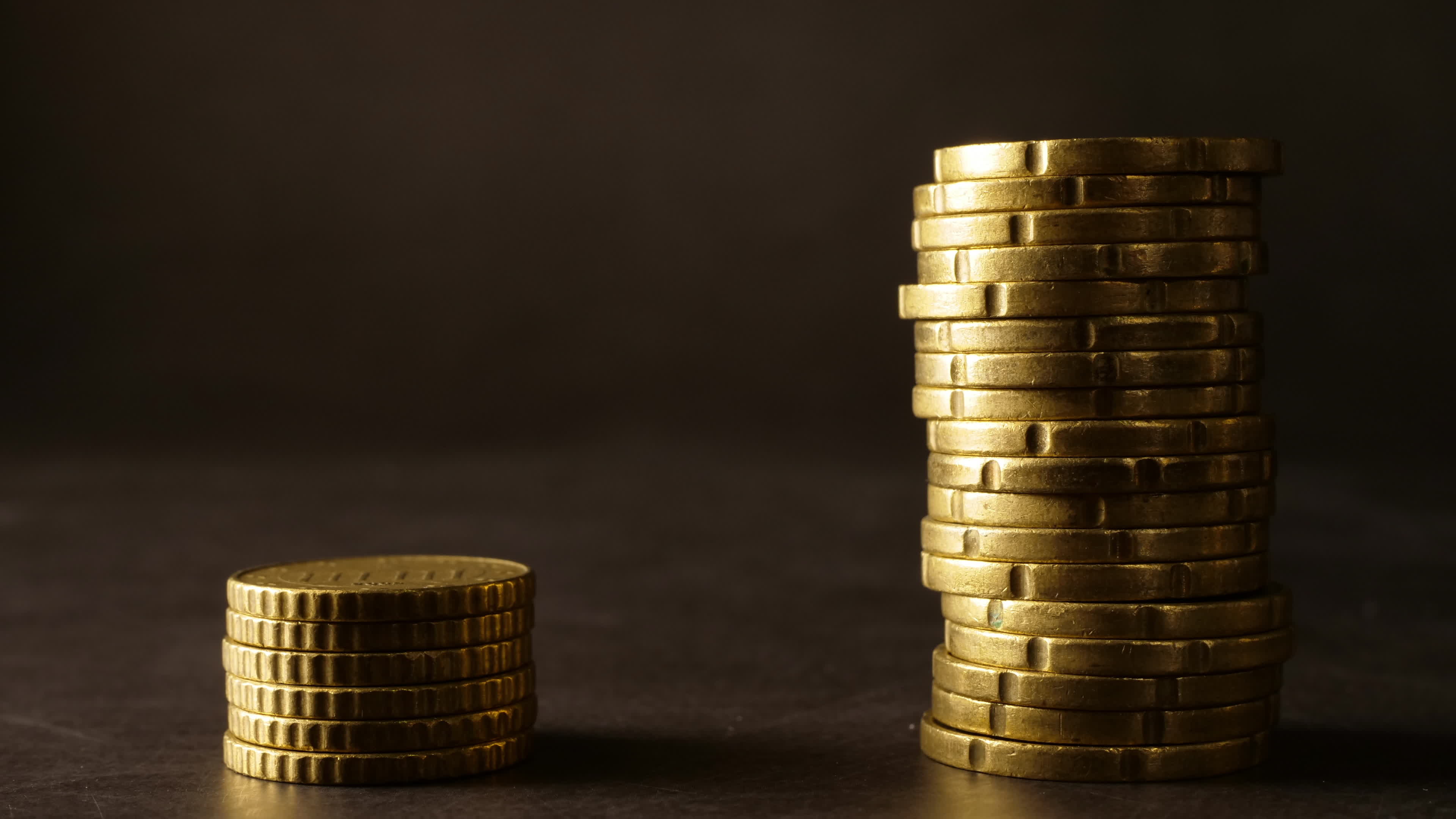 Stacks of coins background 1791008 Stock Video at Vecteezy