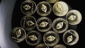 Rotating shot of Bitcoins digital cryptocurrency - BITCOIN ETHEREUM 102 video
