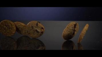 Falling cookies from above onto a reflective surface - COOKIES 249 video