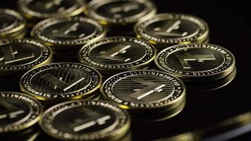 Rotating shot of Bitcoins (digital cryptocurrency) - BITCOIN LITECOIN 218