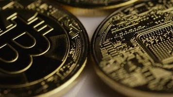 Rotating shot of Bitcoins digital cryptocurrency - BITCOIN 0357 video