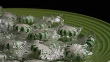 Rotating shot of spearmint hard candies - CANDY SPEARMINT 015 video
