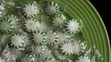 Rotating shot of spearmint hard candies - CANDY SPEARMINT 002 video