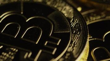 Rotating shot of Bitcoins digital cryptocurrency - BITCOIN 0312 video