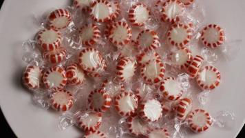 Rotating shot of peppermint candies - CANDY PEPPERMINT 001