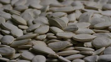 Cinematic, rotating shot of pumpking seeds - PUMPKIN SEEDS 037 video