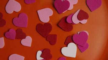 Rotating stock footage shot of Valentines decorations and candies - VALENTINES 0092 video