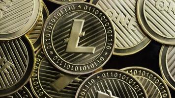 Rotating shot of Bitcoins digital cryptocurrency - BITCOIN LITECOIN 306 video