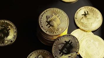 Rotating shot of Bitcoins (digital cryptocurrency) - BITCOIN 0098