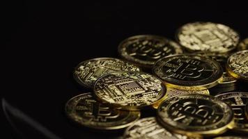 Rotating shot of Bitcoins (digital cryptocurrency) - BITCOIN 0603 video