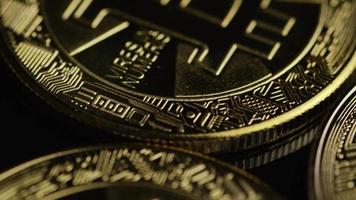 Rotating shot of Bitcoins (digital cryptocurrency) - BITCOIN 0517