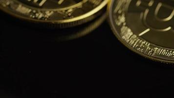 Rotating shot of Bitcoins digital cryptocurrency - BITCOIN 0476 video