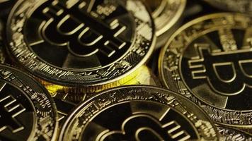 Rotating shot of Bitcoins digital cryptocurrency - BITCOIN 0549 video