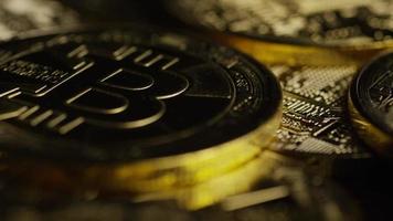 Rotating shot of Bitcoins (digital cryptocurrency) - BITCOIN 0614