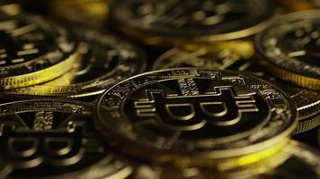 Rotating shot of Bitcoins (digital cryptocurrency) - BITCOIN 0562 video