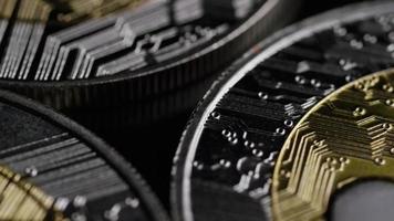 Rotating shot of Bitcoins (digital cryptocurrency) - BITCOIN RIPPLE 0095 video