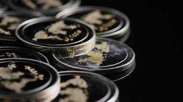 Rotating shot of Bitcoins digital cryptocurrency - BITCOIN RIPPLE 0154 video