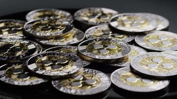 Rotating shot of Bitcoins (digital cryptocurrency) - BITCOIN RIPPLE 0117 video