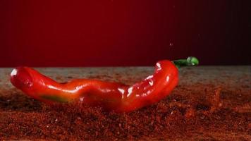 Peppers falling and bouncing in ultra slow motion 1,500 fps on a reflective surface - BOUNCING PEPPERS PHANTOM 013 video
