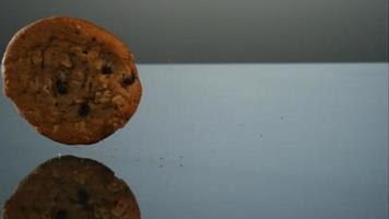 Cookies falling and bouncing in ultra slow motion (1,500 fps) on a reflective surface - COOKIES PHANTOM 078