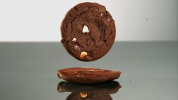 Cookies falling and bouncing in ultra slow motion (1,500 fps) on a reflective surface - COOKIES PHANTOM 081 video