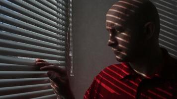 Man Stands Near Window In Hotel Room video