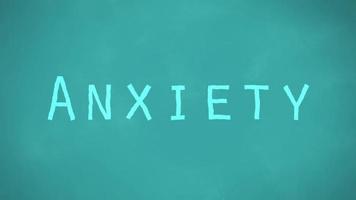 The word ANXIETY Against Teal Chalkboard video