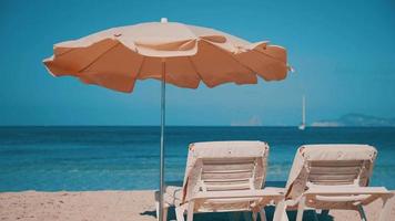 Subeds on a beach with a view to the sea video