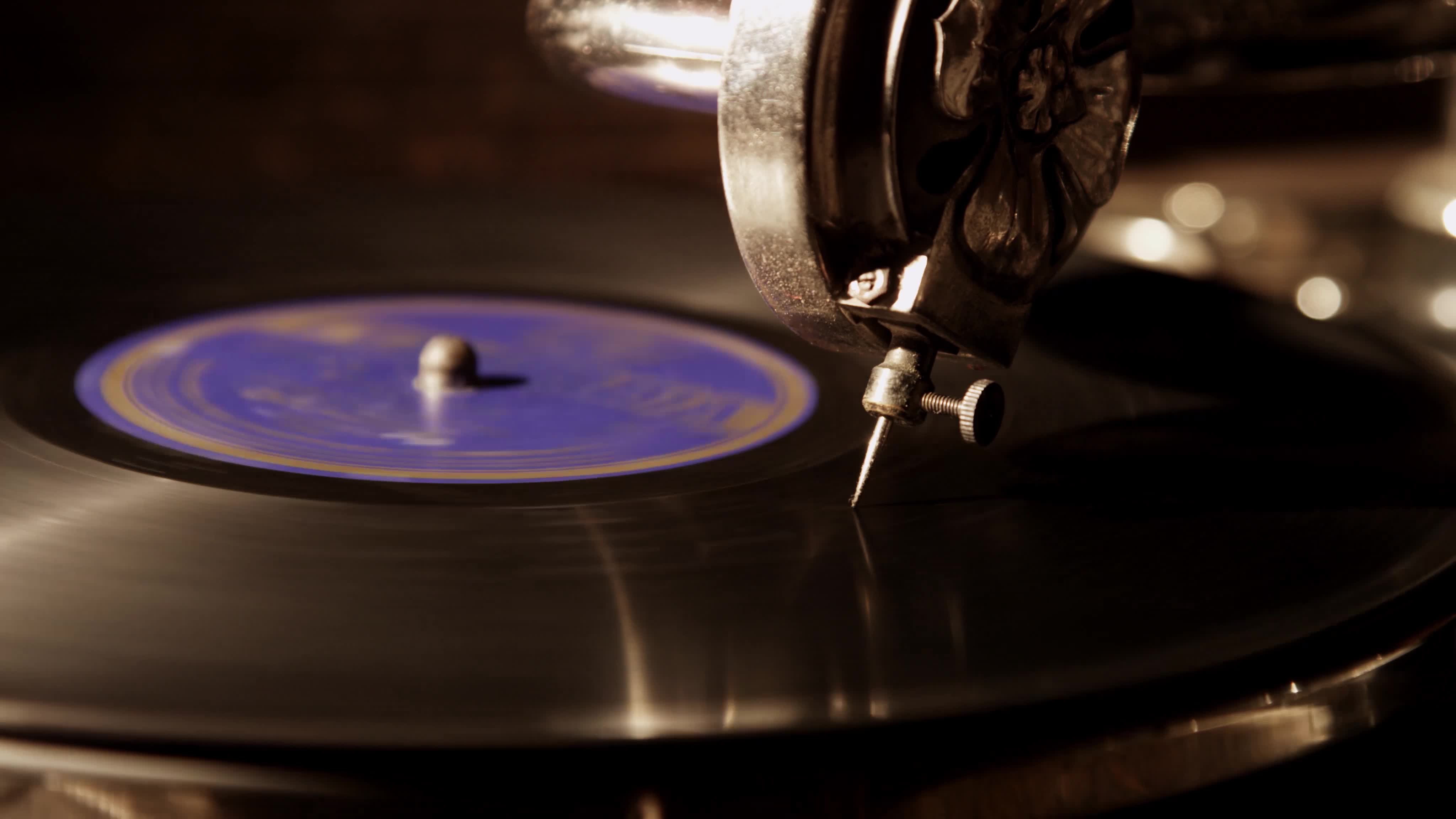 Close Up Shot With Light From Left Side Of Record Player Focusing In The Needle Playing A Vinyl Disc With Purple Label In 4k Stock Video At Vecteezy