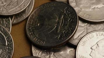 Rotating stock footage shot of American quarters coin - 0.25 - MONEY 0229 video