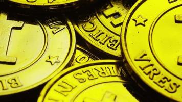 Rotating shot of Bitcoins digital cryptocurrency - BITCOIN 0235 video