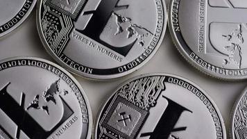 Rotating shot of Litecoin Bitcoins digital cryptocurrency - BITCOIN LITECOIN 0110 video