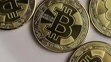 Rotating shot of Bitcoins (digital cryptocurrency) - BITCOIN 0249