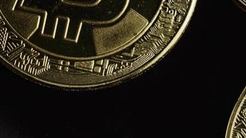 Rotating shot of Bitcoins digital cryptocurrency - BITCOIN 0502 video