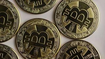 Rotating shot of Bitcoins (digital cryptocurrency) - BITCOIN 0248