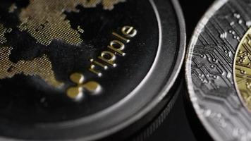 Rotating shot of Bitcoins (digital cryptocurrency) - BITCOIN RIPPLE 0171