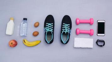 Stop motion - objects for exercise on gray background. video