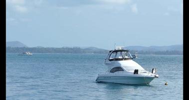 Luxury white speed boat on a blue sea 