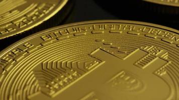 Rotating shot of Bitcoins (digital cryptocurrency) - BITCOIN 0014