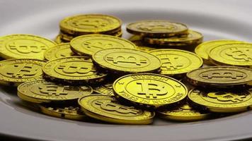 Rotating shot of Bitcoins digital cryptocurrency - BITCOIN 0237 video